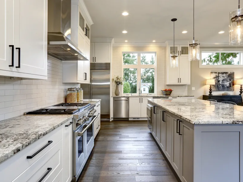 white kitchen cabinets and brown vinyl floor from Johnson & Sons Flooring in Knoxville, TN