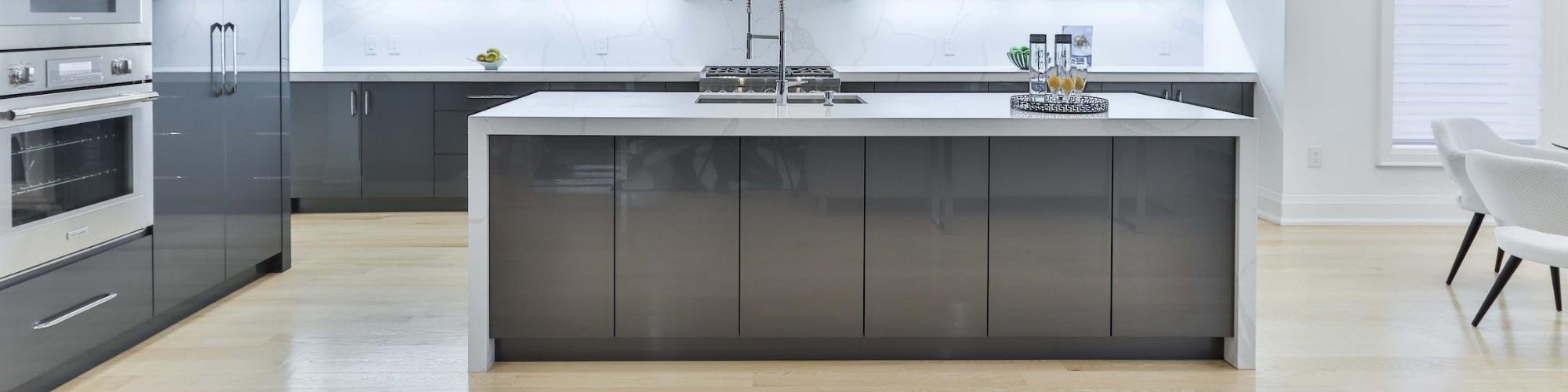 gray kitchen island with white countertop from Johnson & Sons Flooring in Knoxville, TN